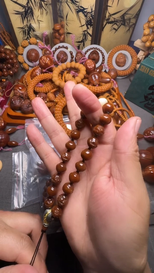 手串橄榄核是***呀宝宝佛