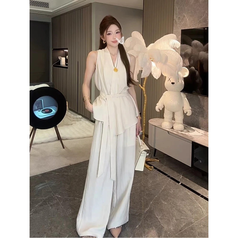 优秀的金蘑菇 法式无袖收腰绑带设计上衣高腰阔腿裤两件套装