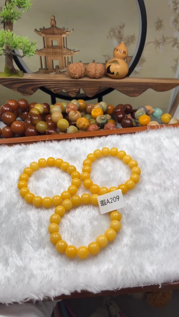 【闪购商品】菩提根/象牙果吊坠瑕A209苹果珠12mm一串随机