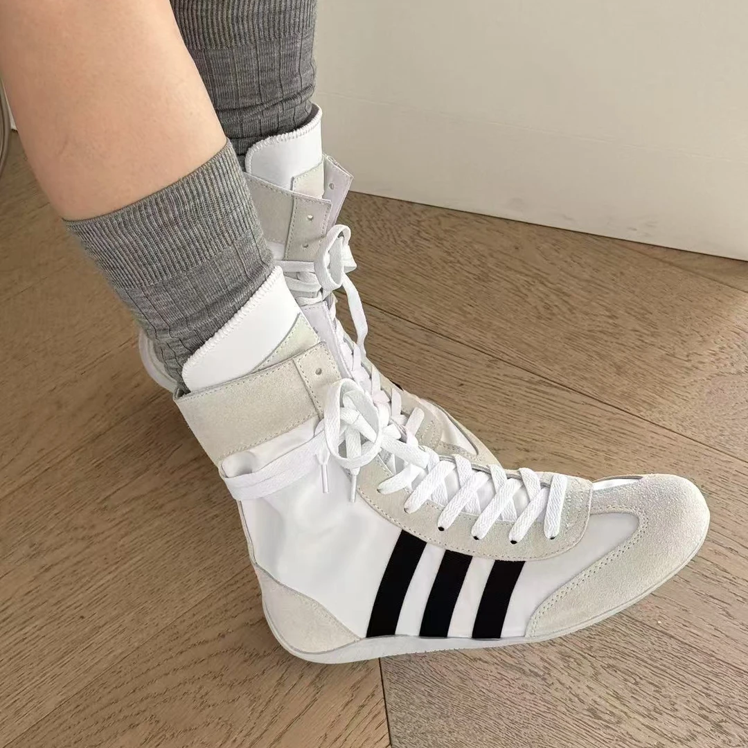 诗歌兰女鞋2025春季新款真皮休闲平底系带韩版高帮休闲鞋6310-51