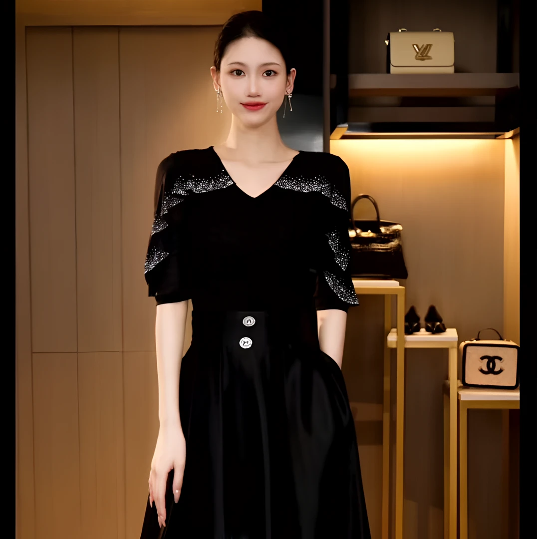 DY25X-658夏季新款网纱时尚V领镂空重工荷叶边烫钻百搭中袖女