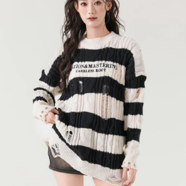 A768破洞宽松圆领毛衣ZD07031ST409