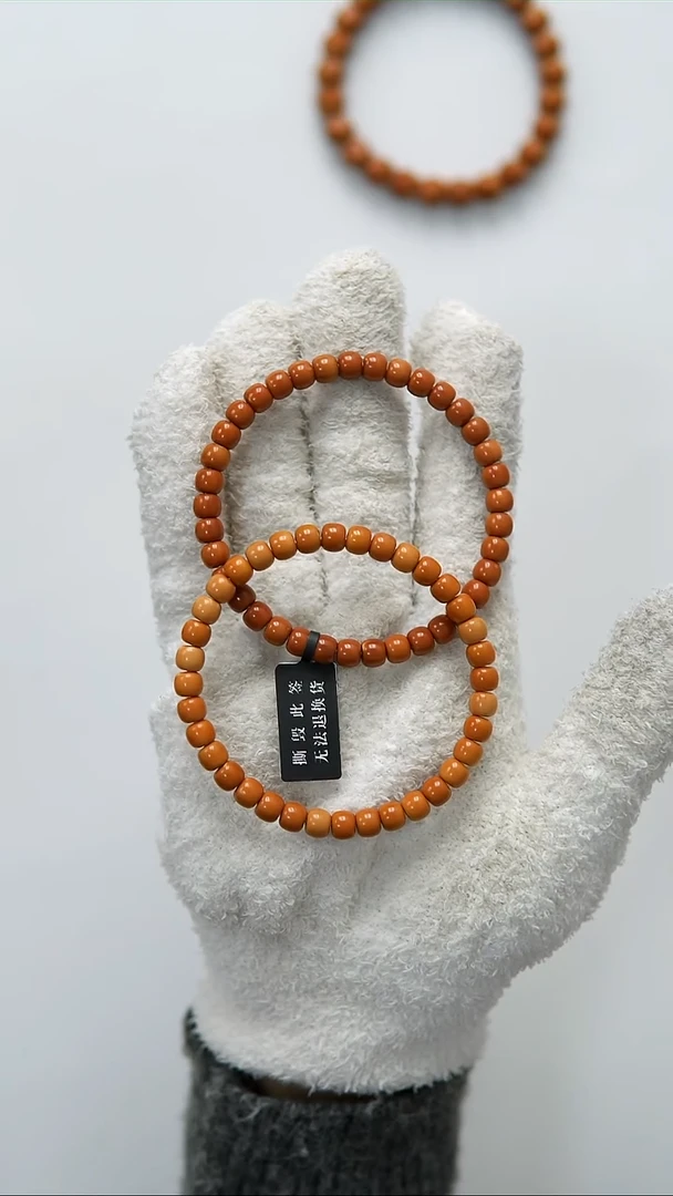 手串橄榄核M****。6.2mm 微瑕老挝核尖单圈