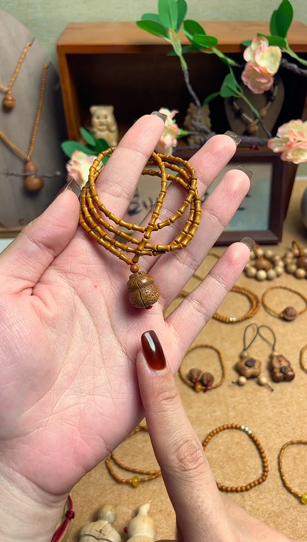 桃核竹节108颗葫芦脖挂    一物一拍