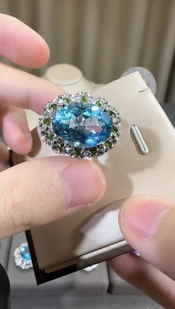 银S925镶嵌戒指托帕石12*16mm妖姬蓝戒指鸽子蛋设计款