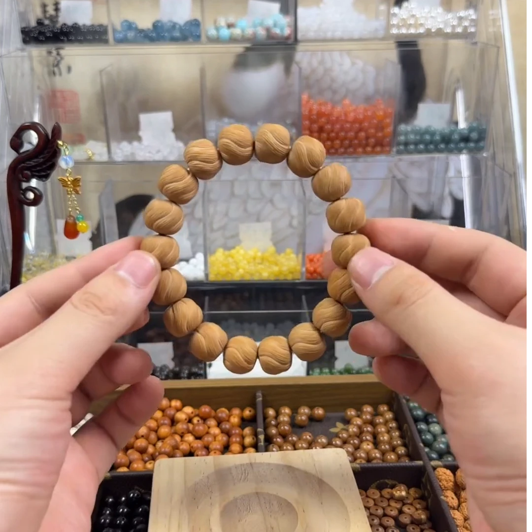 猴头核桃顶凤真凤羽高订款单圈文玩手串