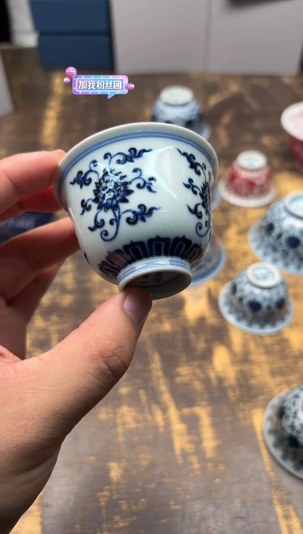 言**。一峯窑青花缠枝莲花神杯