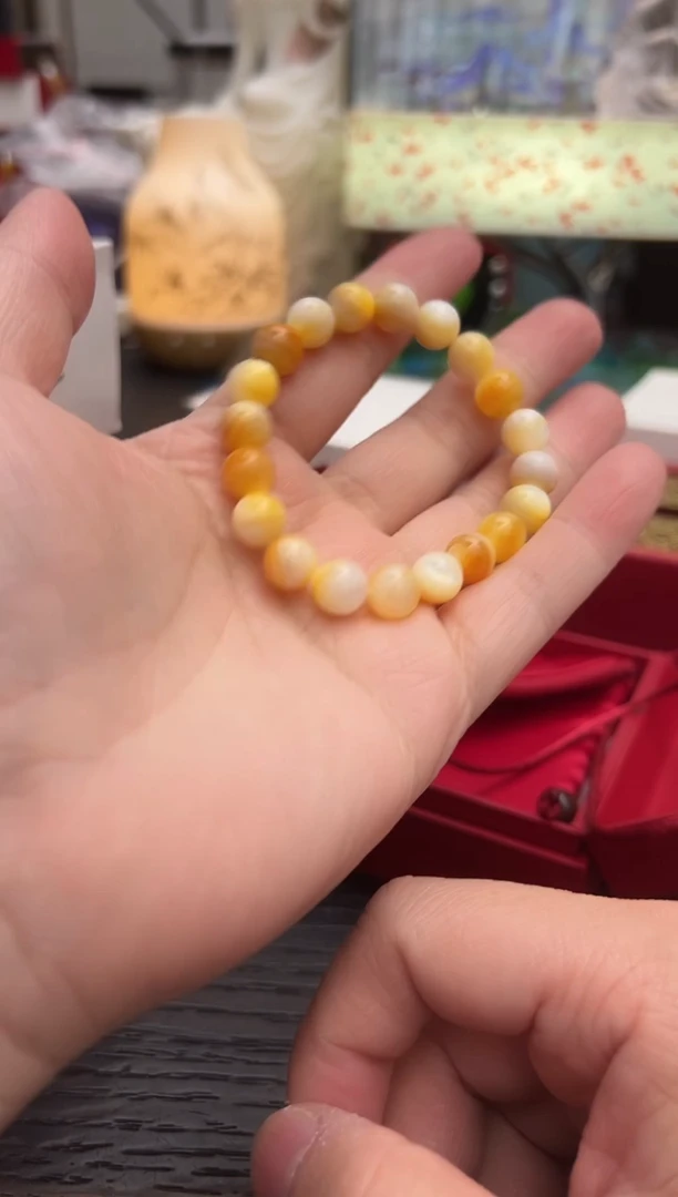 珍珠贝手串0.8黄