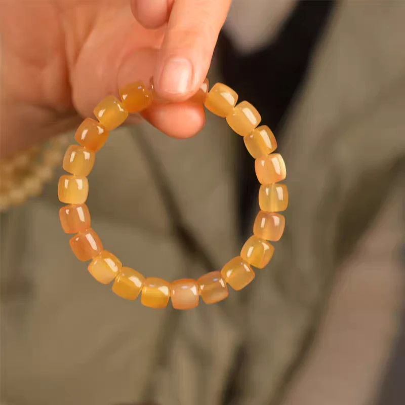 1254号-8mm蜜色西直切归圆手串