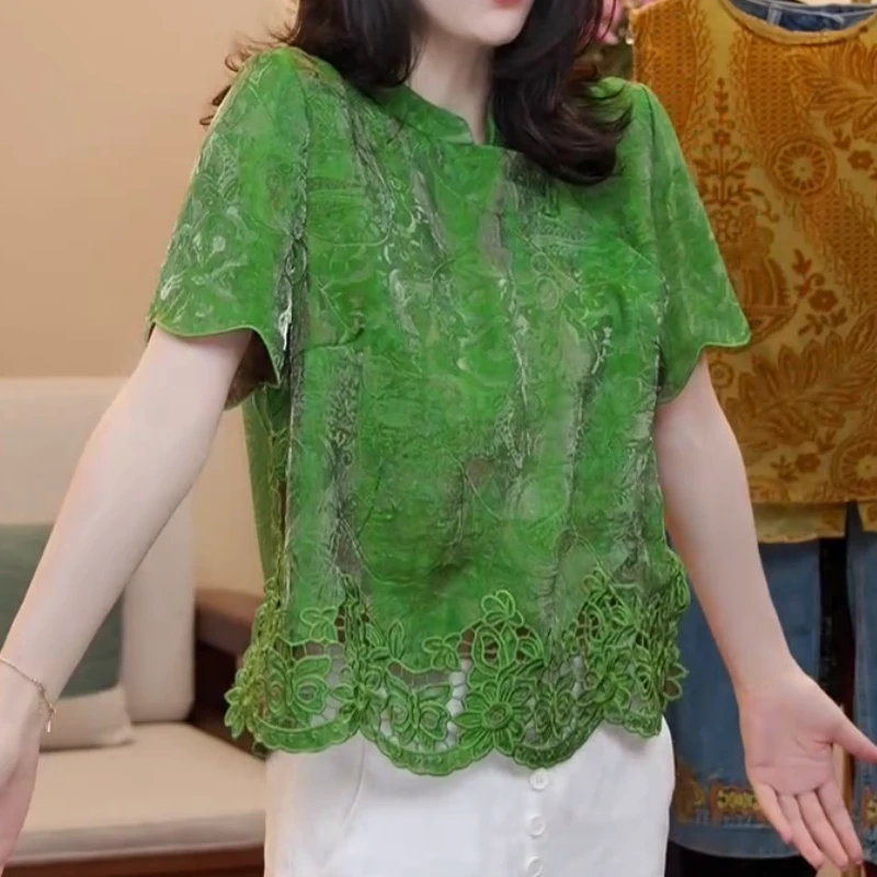 2025新款夏季显瘦百搭气质时尚下摆短袖镂空上衣LK253983
