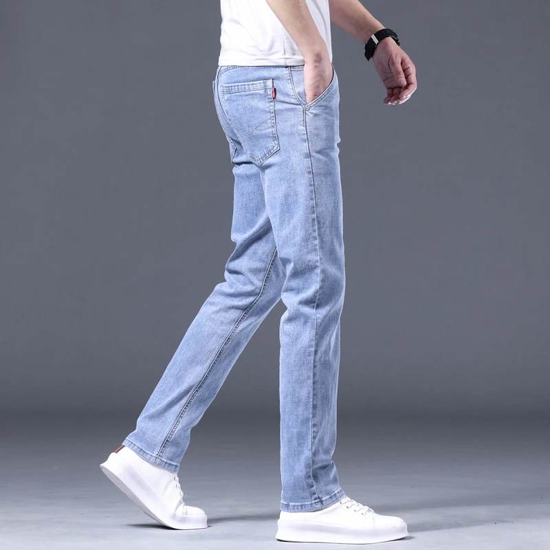 香港夏季薄款牛仔裤男士韩版宽松直筒弹力浅蓝高端商务休闲长裤子