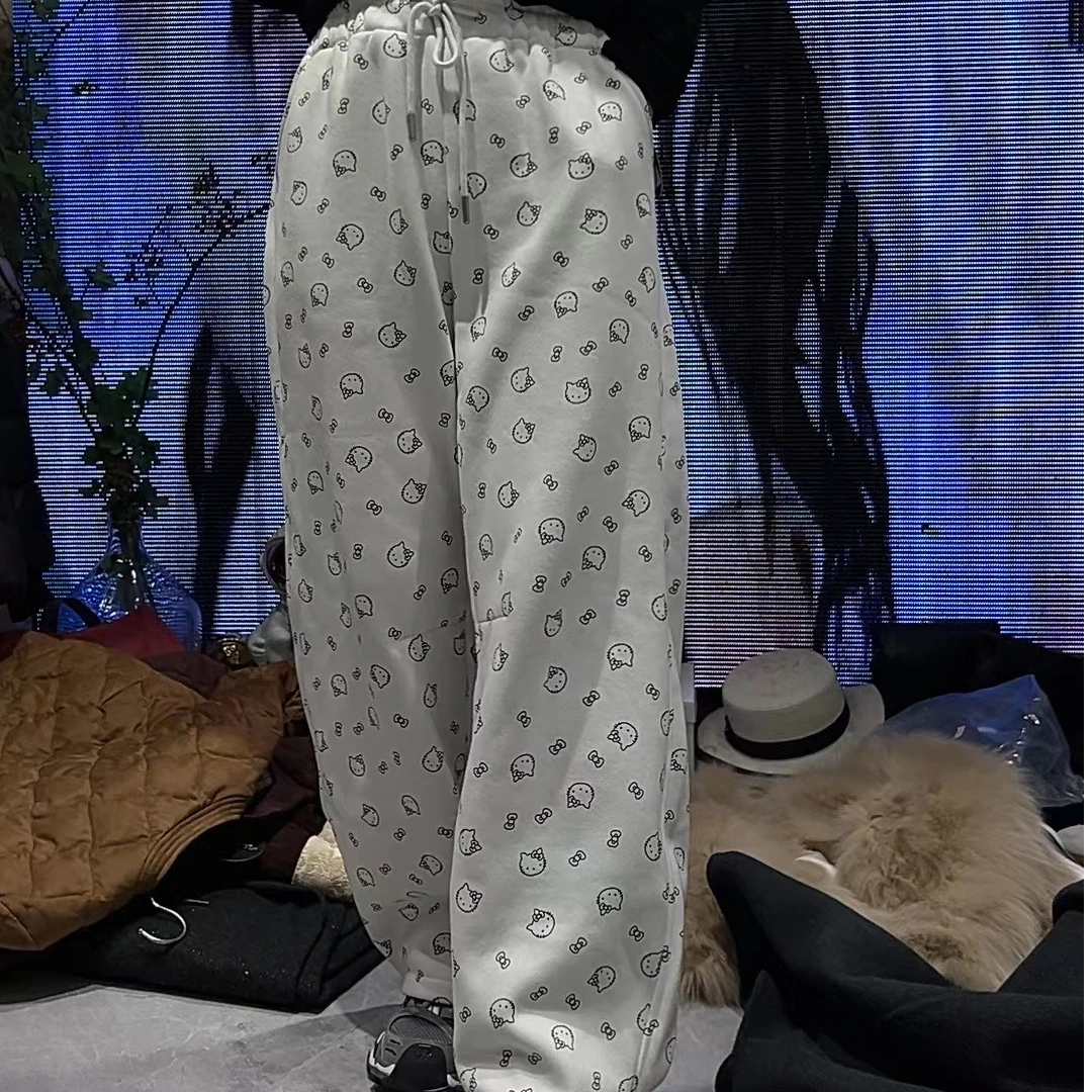 KEMI2025新款潮牌时尚复古KT猫弯刀卫裤1221有去无回（裤长103）