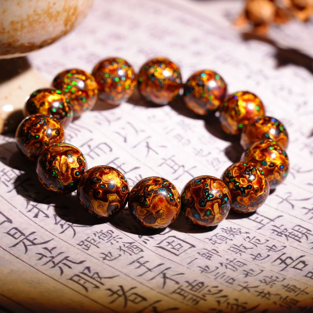 “天然大漆”1.6贴金千层漆珠手串