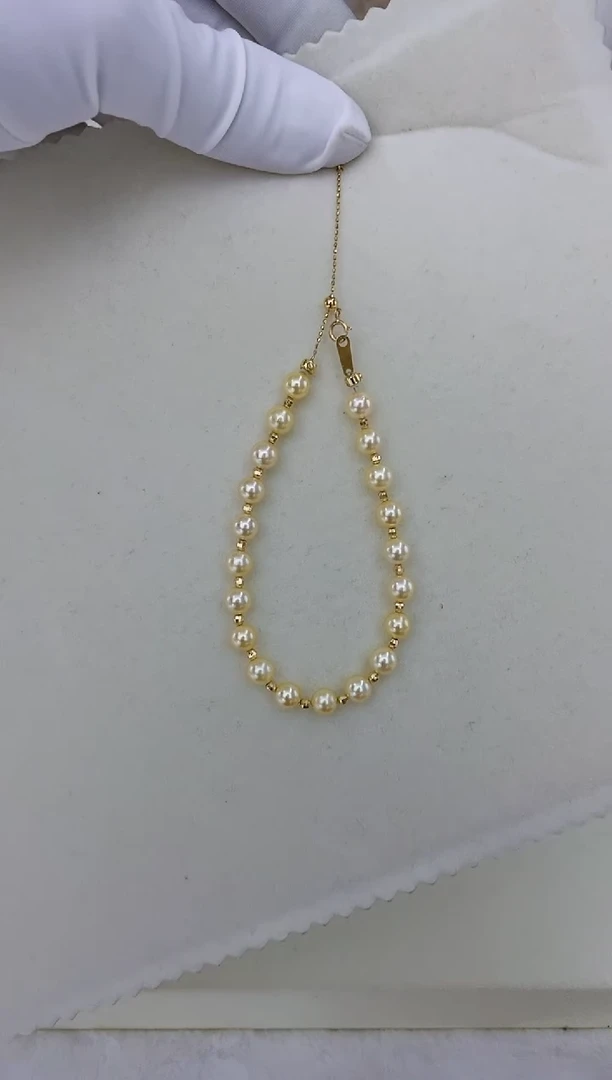 18K金镶嵌akoya海水珍珠羽皇金手链5.5-6mm