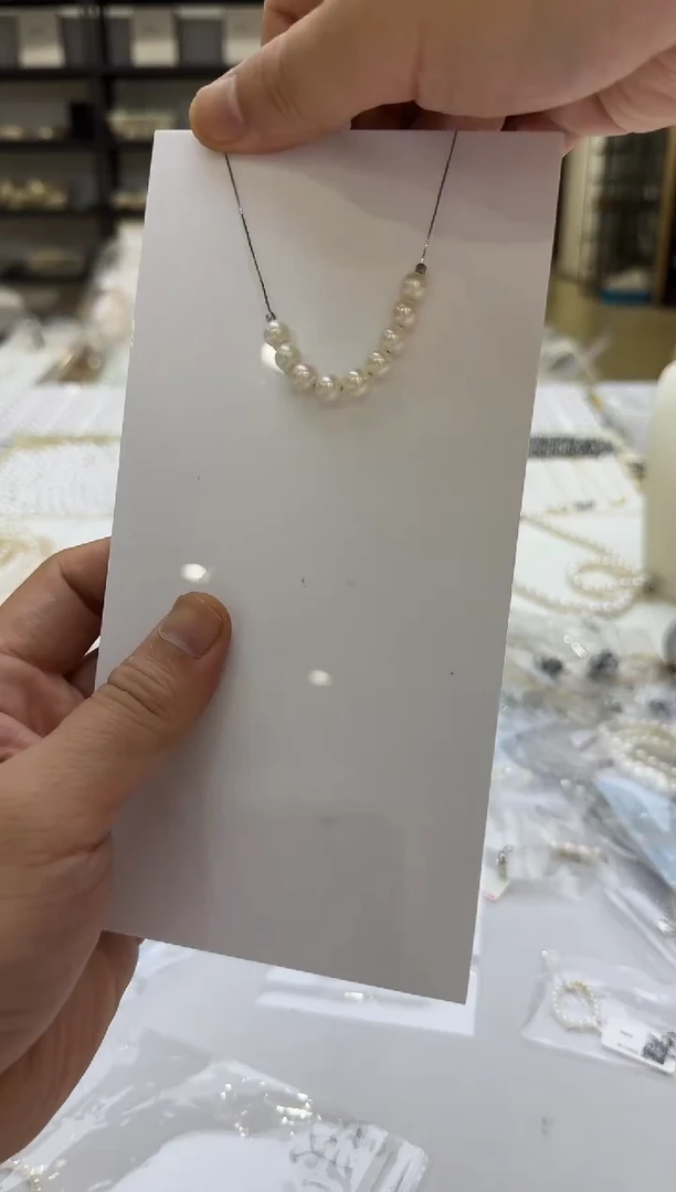 淡水珍珠银S925镶嵌吊坠(赠链)7mm 微笑链9颗