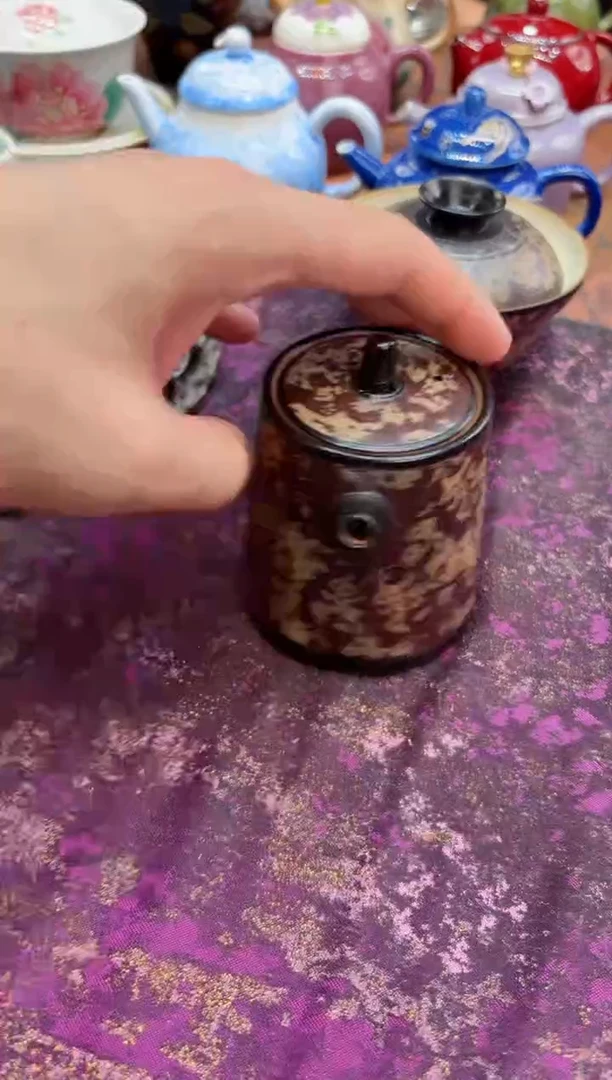 摩吉陶陶闪拍链接 皮革直升壶