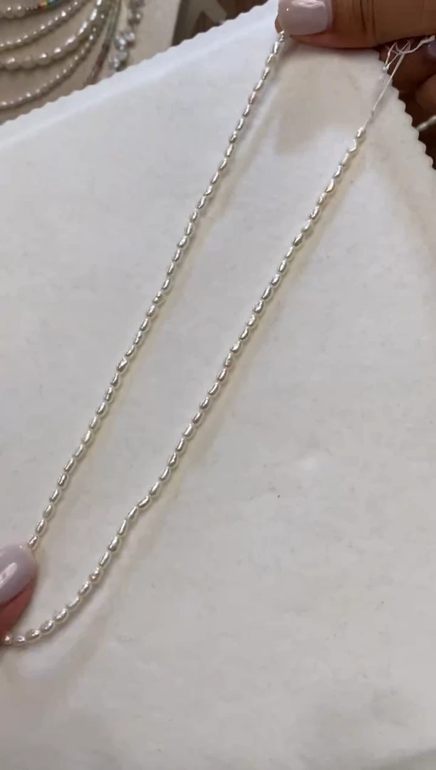 淡水珍珠手绳钛钢米珠项链