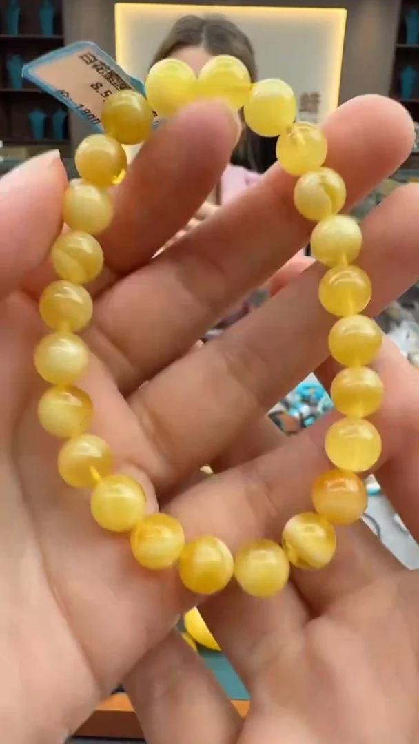 手链琥珀未镶嵌25秒拍号 假一罚三