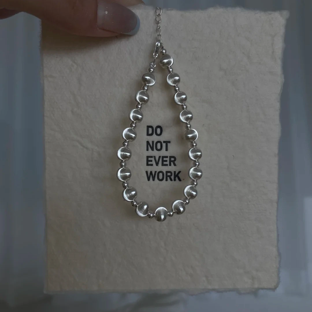 925银手链 万西西2025爆款超闪发光镭射猫眼S925银手链