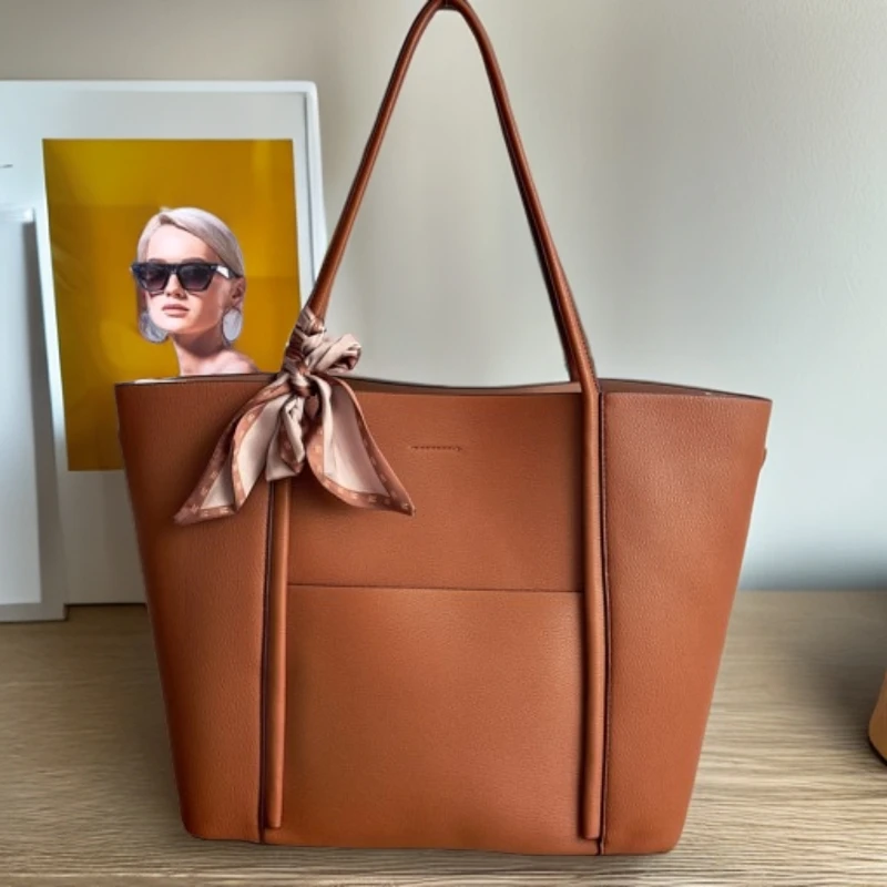 牛皮托特包女大容量新款真皮轻奢上班通勤包小众感单肩大包休闲