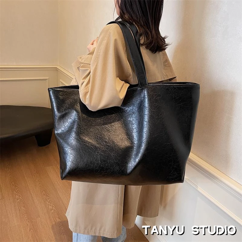 探屿旅行大包手提托特包女士新款高级质感大容量通勤包斜挎单肩包