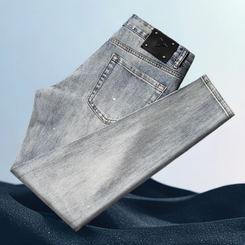 巴赛娜缇时尚潮流泼墨牛仔裤男夏季薄油漆点猫须磨白弹力修身长裤