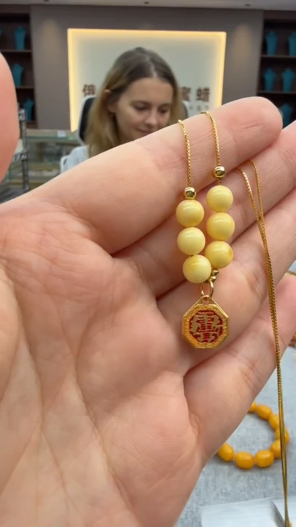 琥珀颈饰未镶嵌9秒拍号 假一罚三