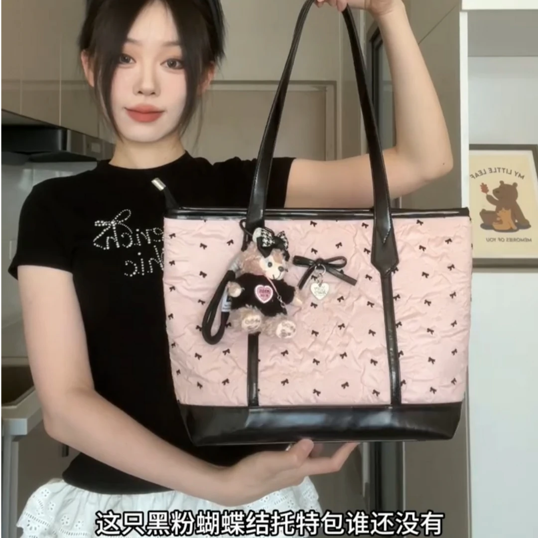 超火粉色泡泡纱蝴蝶结托特包包2025新款夏季日常通勤大容量单肩包