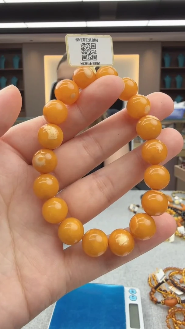 未镶嵌琥珀手链26秒拍号 假一罚三