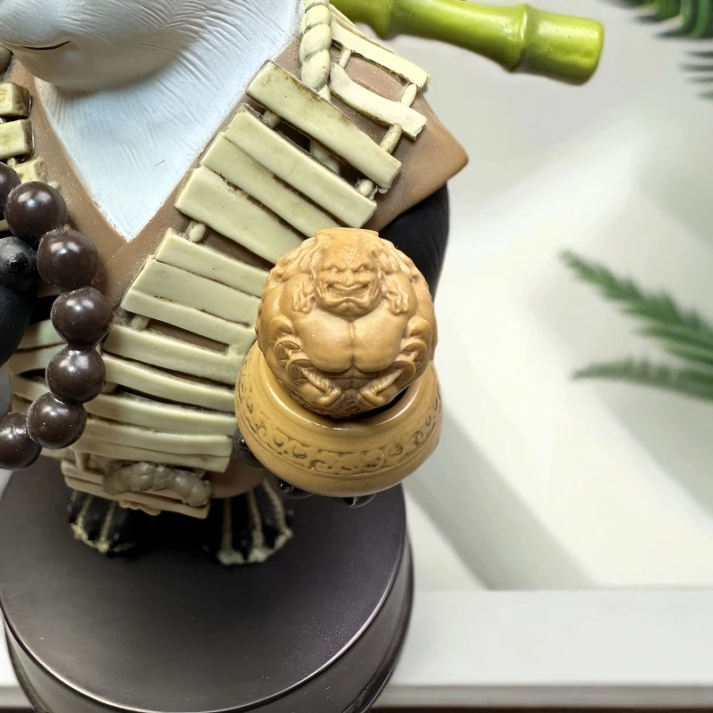 「肌肉黄财神」精工猴头核桃雕刻 孔道镶嵌猴头配饰