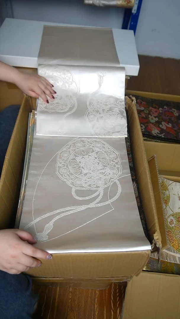 织绣5两通宝相打籽