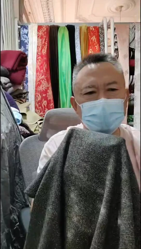 黑咖色深色人字布料