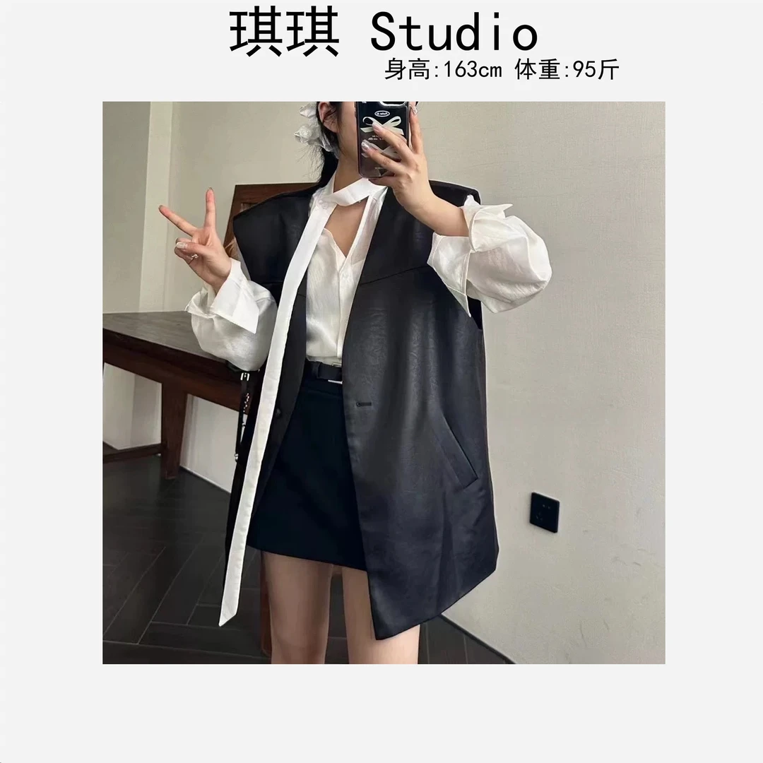 早春新款轻奢高级感辣妹洋气时尚宽松显瘦减龄黑色皮马甲7313-G