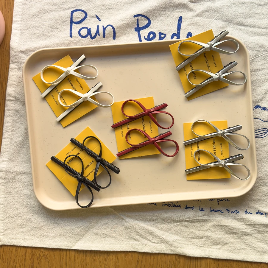 黑色皮质蝴蝶结一字夹鸭嘴夹2024新款发夹发卡前额侧边夹子碎发卡