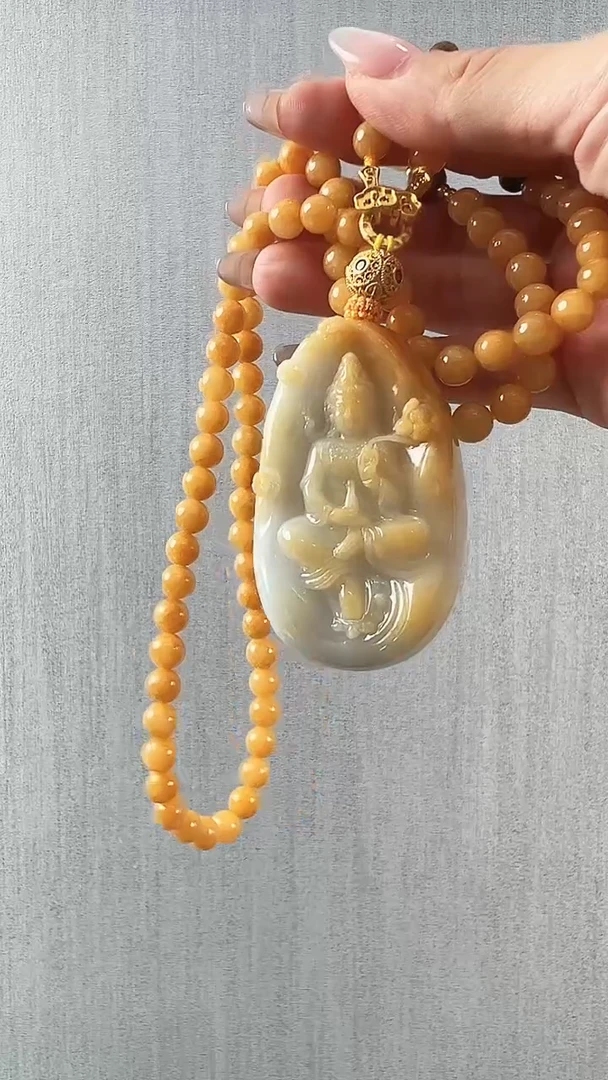 翡翠未镶嵌颈饰观音·