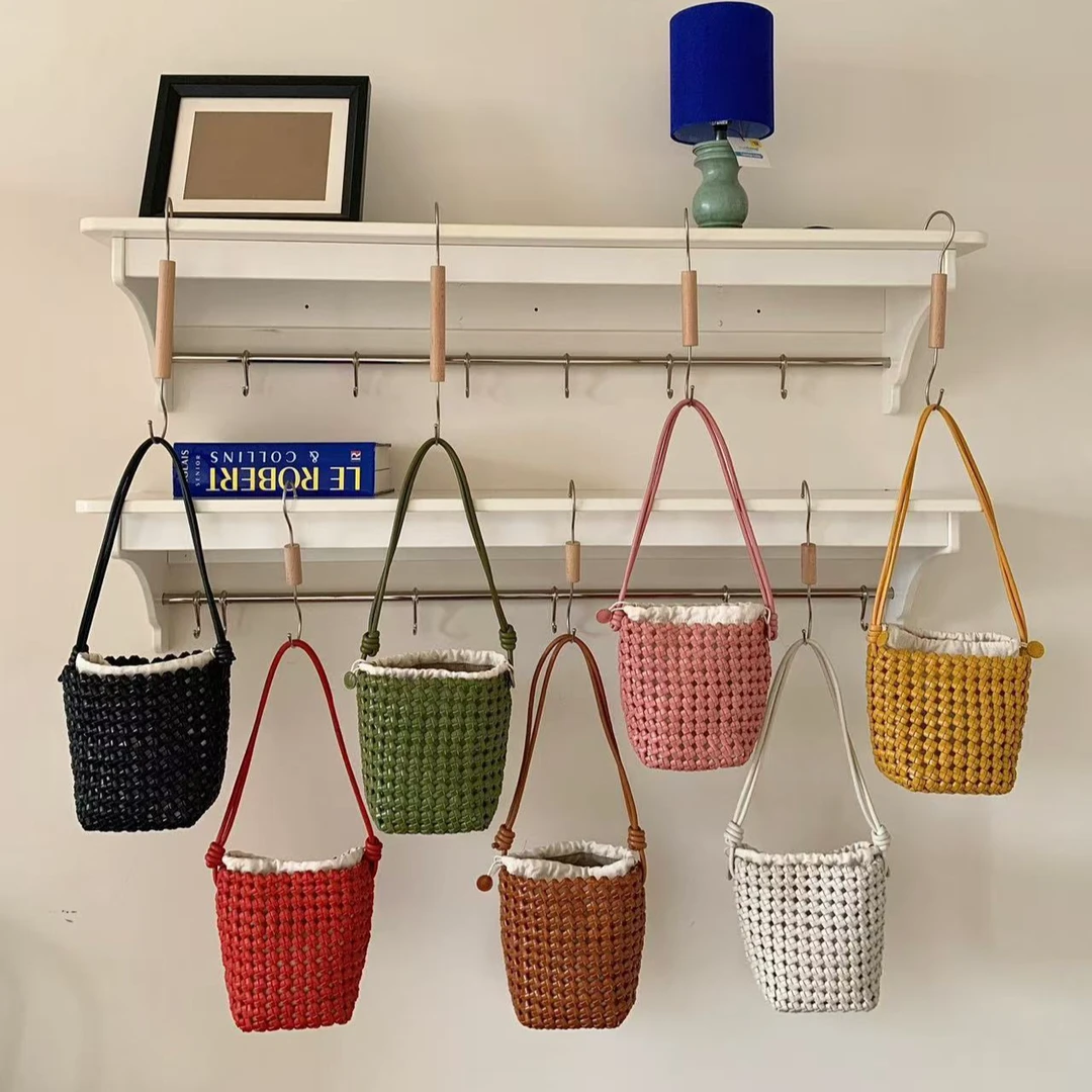 镂空编织水桶包包女2025新款高级感百搭真皮手提单肩腋下斜挎包