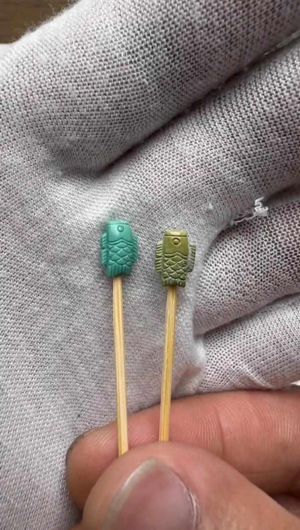 未镶嵌绿松石小木鱼一对左右6.6厚5高9.3