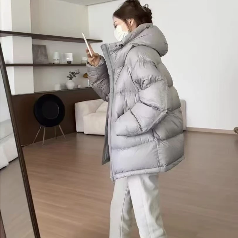 白鸭绒轻奢保暖显瘦防风保暖中长款连帽减龄休闲羽绒服设计师