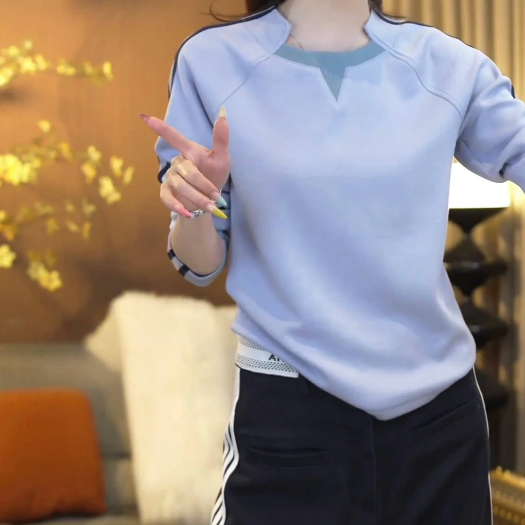 不规则裁剪拼接卫衣2025新款春季时尚潮牌减龄口袋假两件上衣