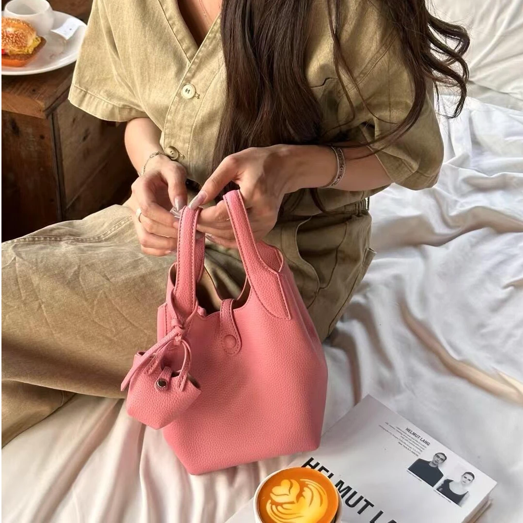 手提菜篮子包包女式2025新款轻奢小众单肩斜挎休闲软皮百搭水桶包