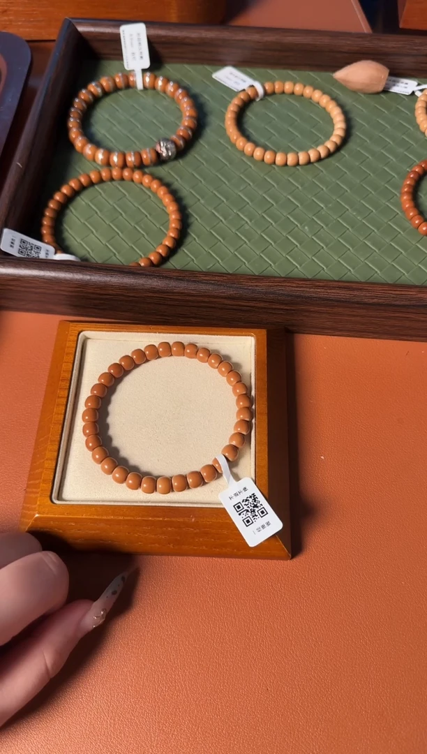 手串橄榄核6.9mm老挝核尖老型单圈、正三花