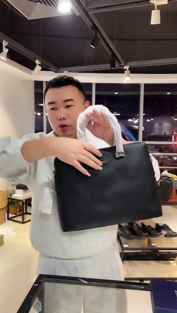 头层牛皮韩爵绅士包包皮具728