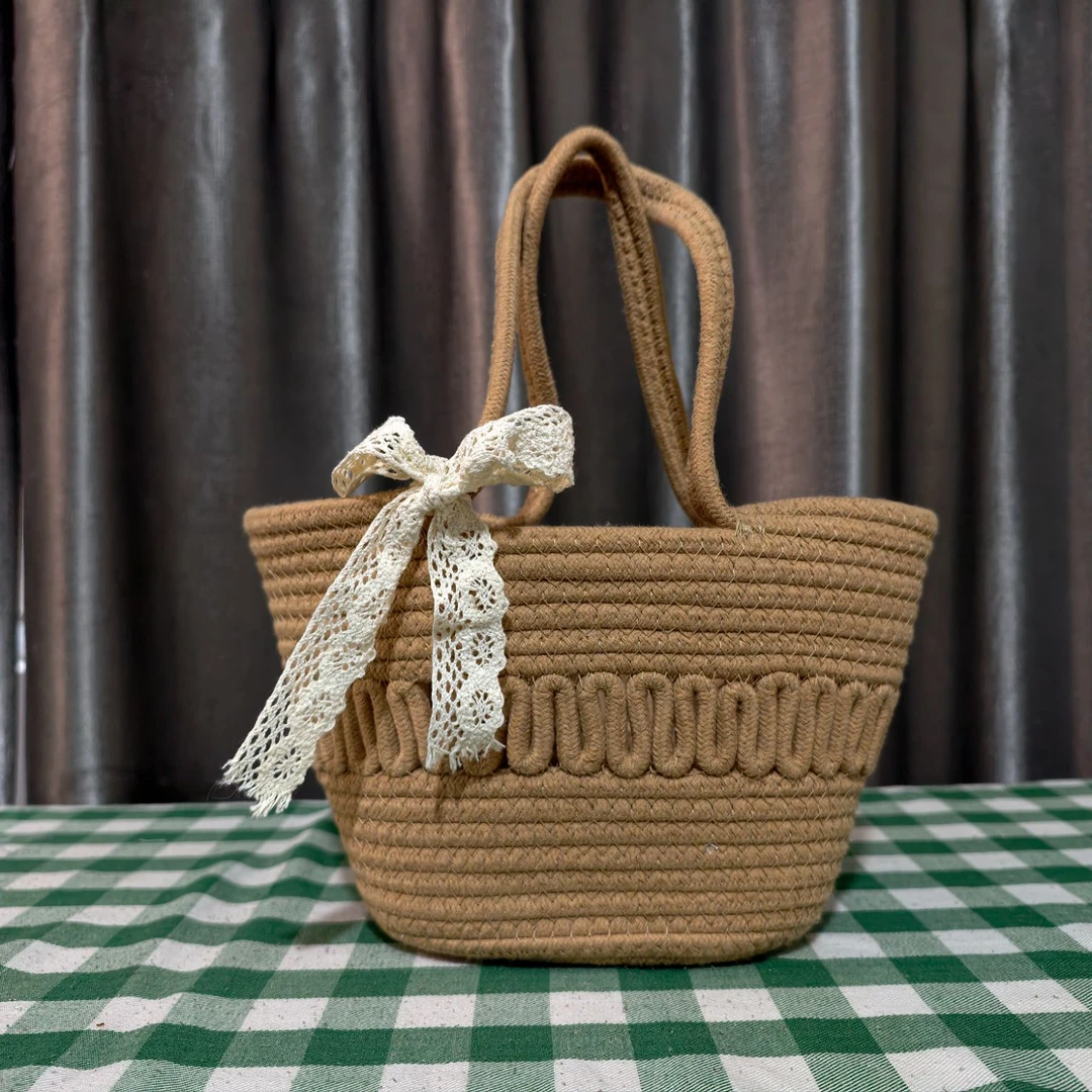 镂空蝴蝶结手提包一个装