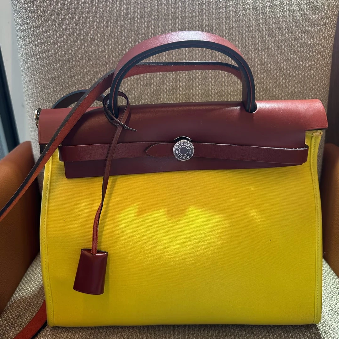 99新 Hermes/爱马仕 爱马仕HERBAG31黄色品红酒A刻单肩包8905001