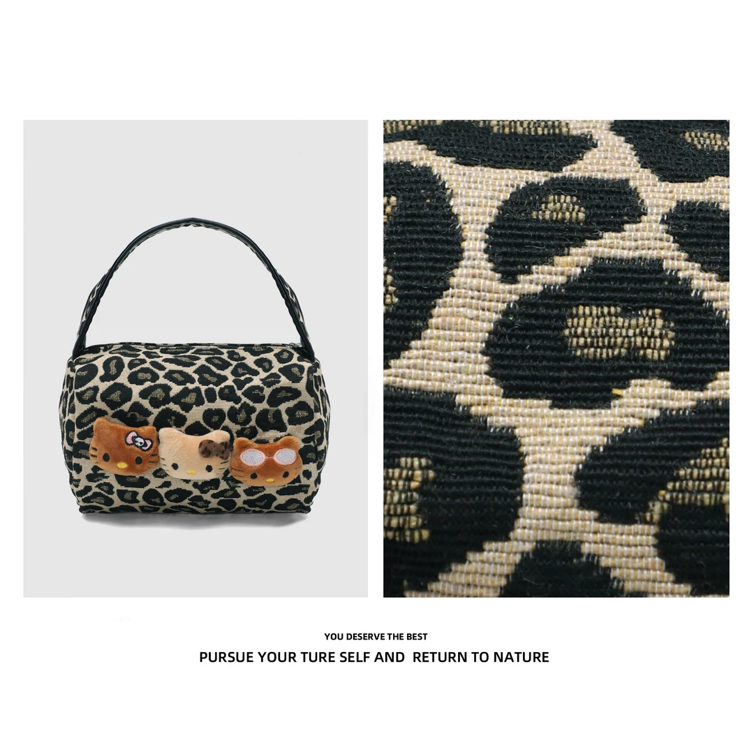 Discover Revive【新款豹纹】黑皮kt猫手提包化妆包便携手拿包