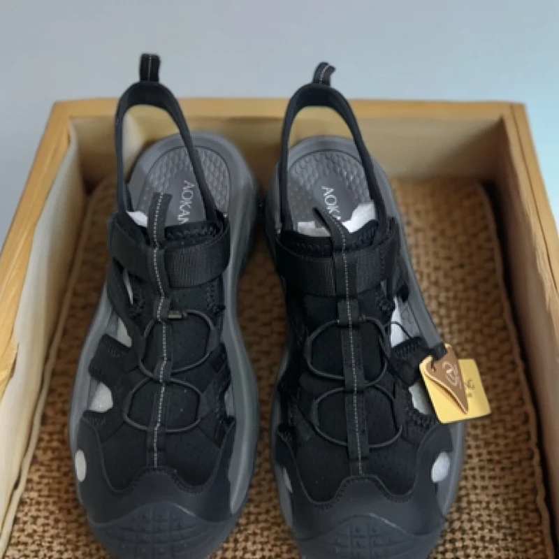 休闲风透气防滑包头松紧带沙滩鞋轻便夏季黑色男款厚底洞洞凉鞋