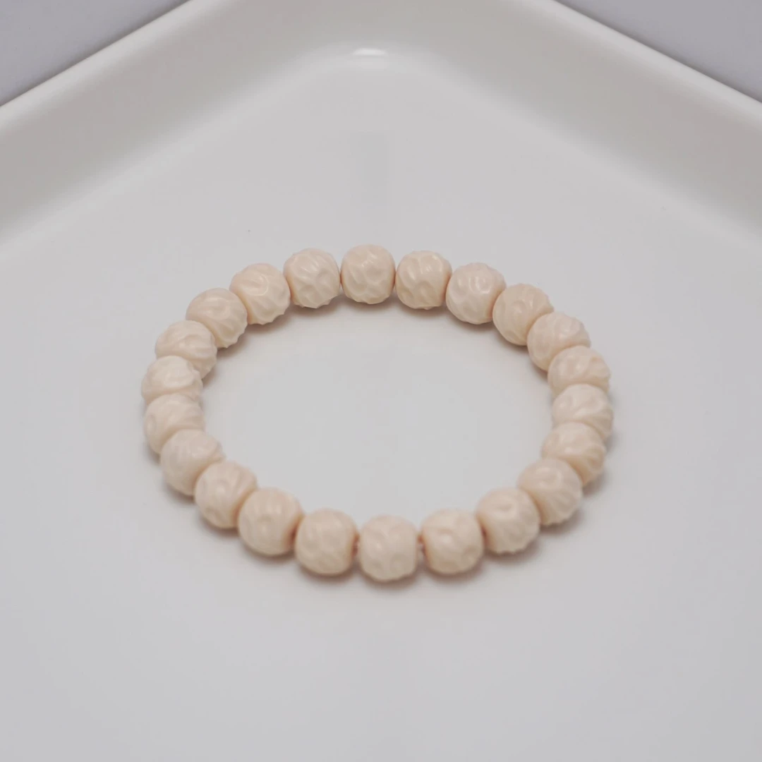 亿君天然猛犸象牙乱山无相单圈手串