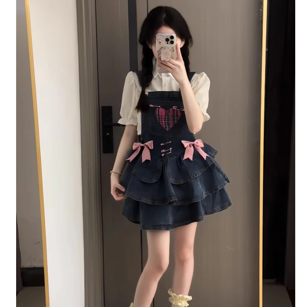 甜美蝴蝶结牛仔背带裙女夏季新款辣妹高腰显瘦蛋糕裙a字百褶短裙