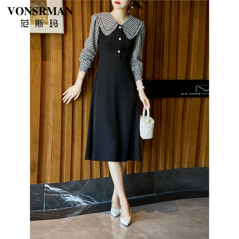 格子拼接娃娃领连衣裙女秋季2025新款法式气质收腰显瘦黑色a字裙