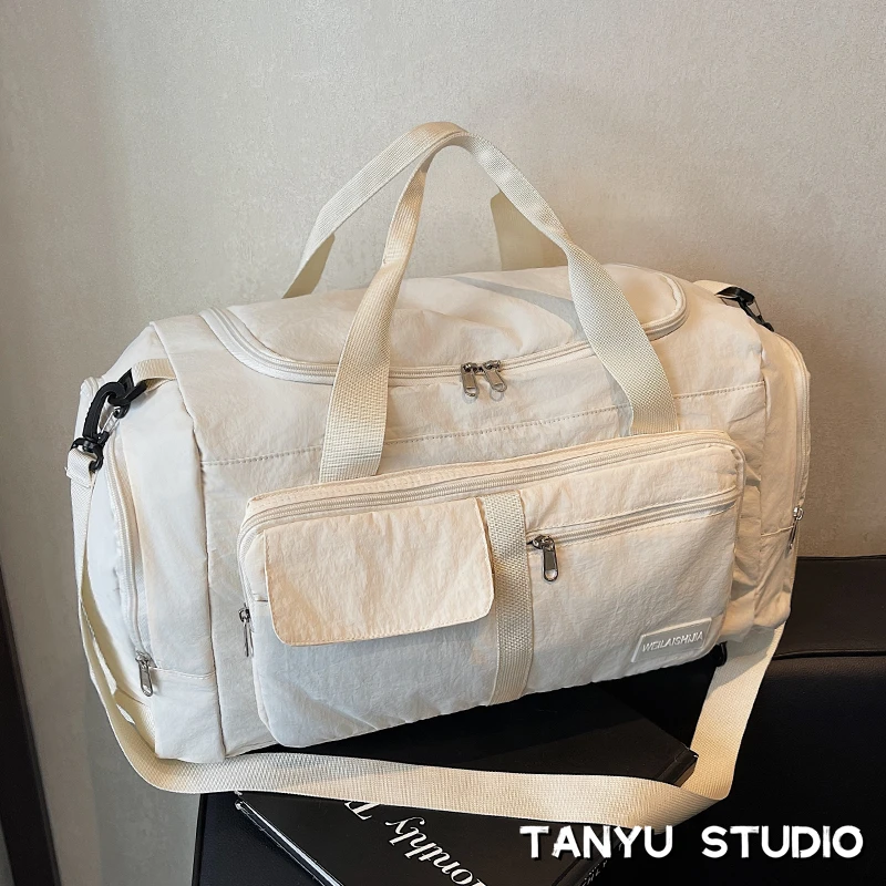 探屿大容量手提短途旅行包女时尚轻便行李包男旅游收纳运动健身包